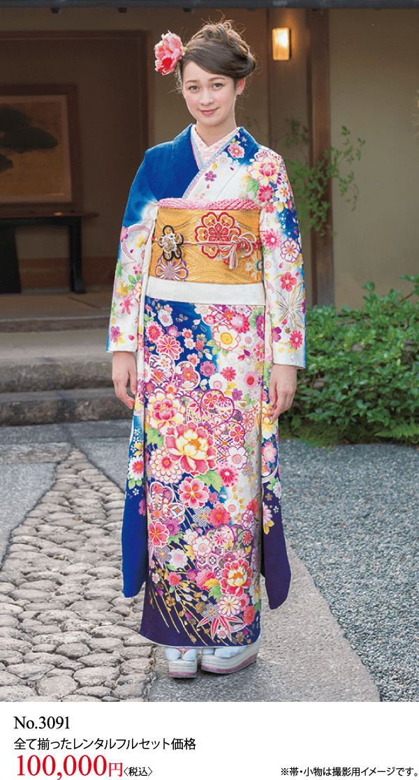 色鮮やかな花柄の着物を着た人が屋外に立っています。価格の文字は赤字で「100,000円」と書かれています。.